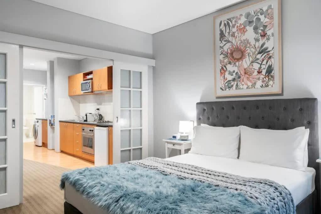 Perth Central Business District Apartment | 708 Enchanting Urban CBD Oasis 1BR & Balcony