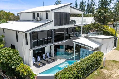 Buddina House | Beachfront at Buddina with Heated Pool & Sea Views