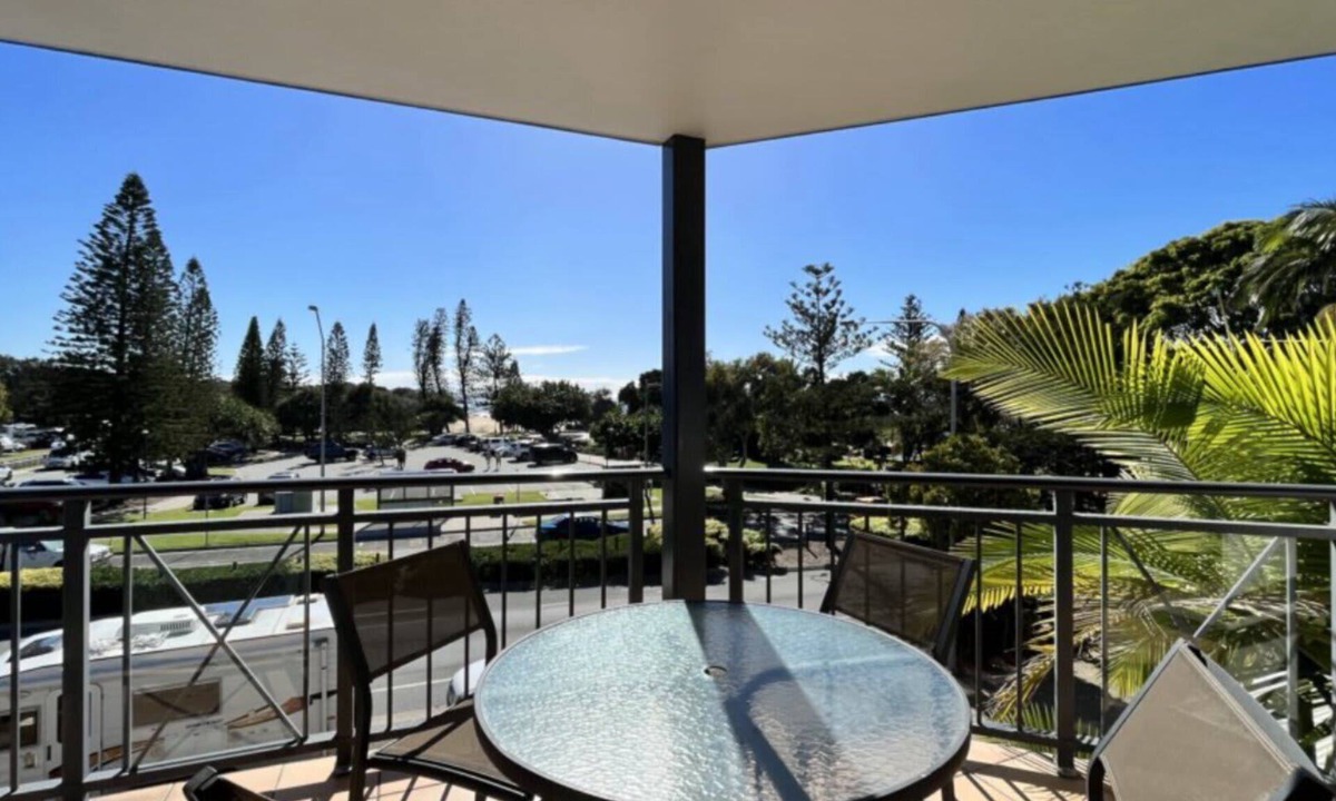 Dicky Beach Apartment | Coastal 2-bedroom apartment at Portobello by the Sea, Dicky Beach. Enjoy ocean glimpses, resort pool, and BBQ area. Sleeps 4 comfortably. Steps from surf, cafes, and shops. Perfect for a relaxing Sunshine Coast holiday.