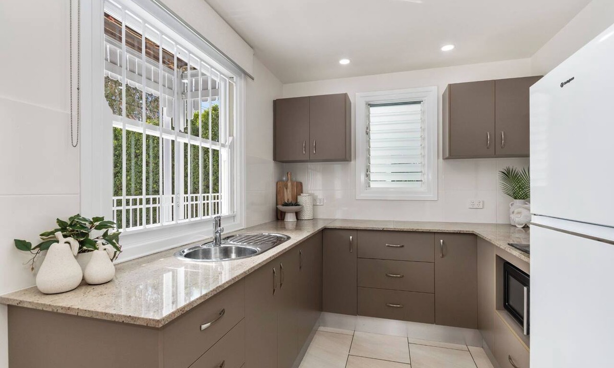 North Ward Apartment | Coastal Corner Poolside Retreat on The Strand