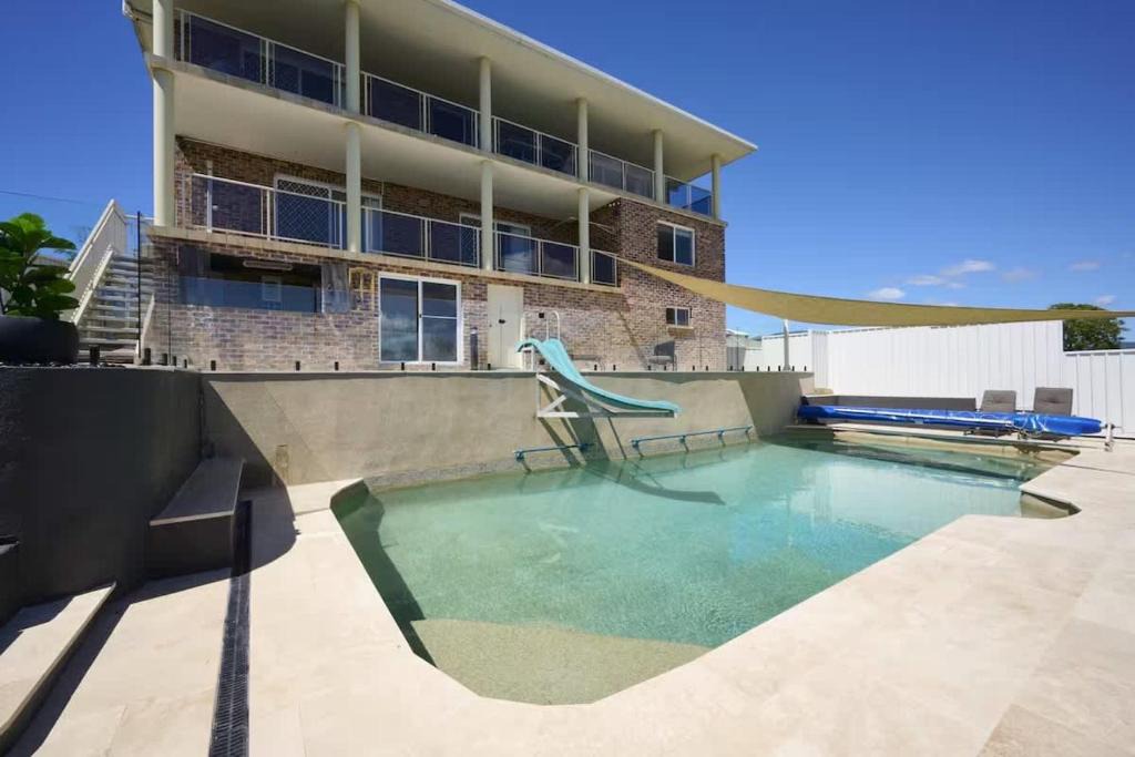 Woolgoolga House | Coastal Retreat with Pool and Balcony Views