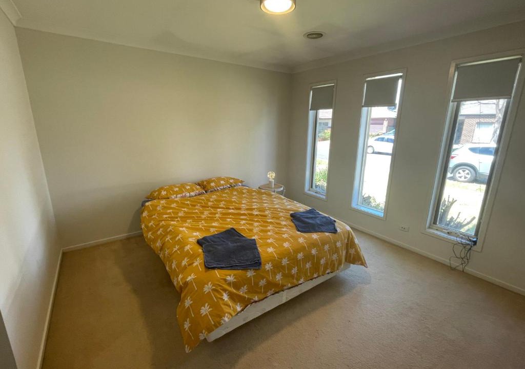 Point Cook House | Elegant master bedroom with private bathroom
