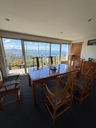 Dynnyrne House | Elevated Water Views Peaceful 4BR Retreat
