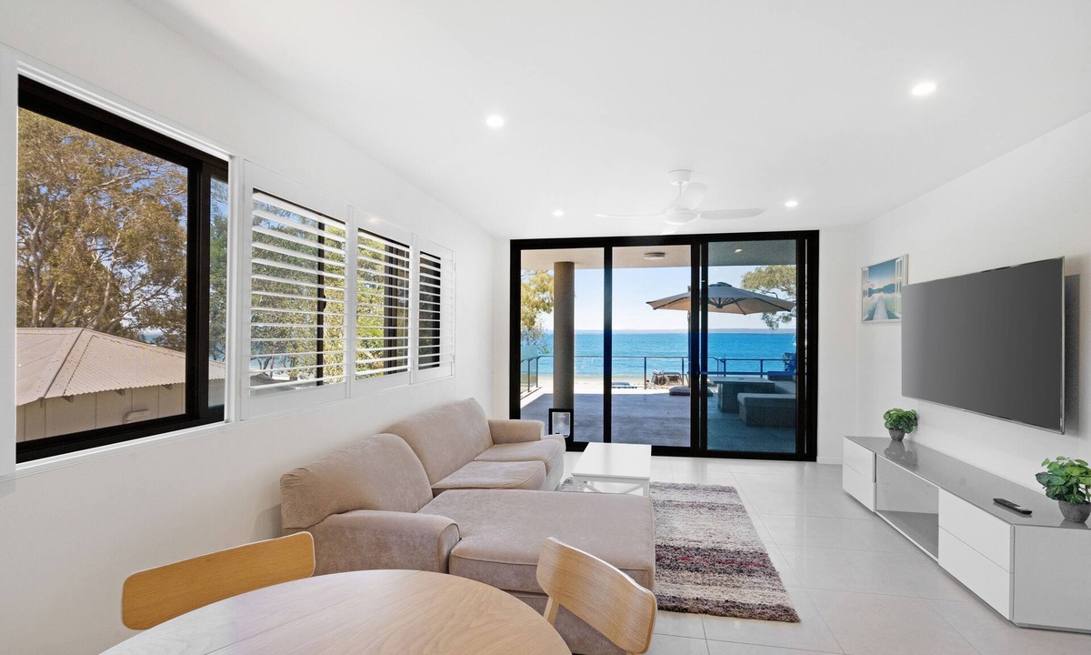 Bongaree Apartment | Near new, absolute beachfront apartment with views of Redcliff and Brisbane.