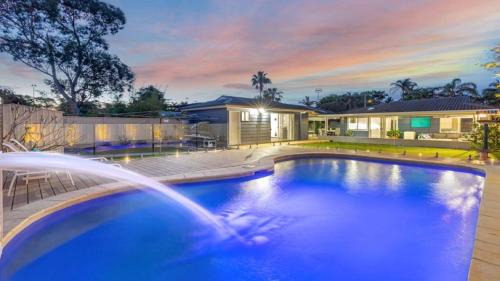 Berkeley Vale House | Poolside Family Retreat By Holidayco