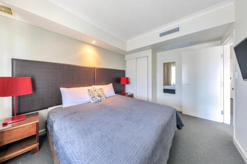 Darwin City Centre Apartment | Resort Style Escape King Bed Pool Balcony