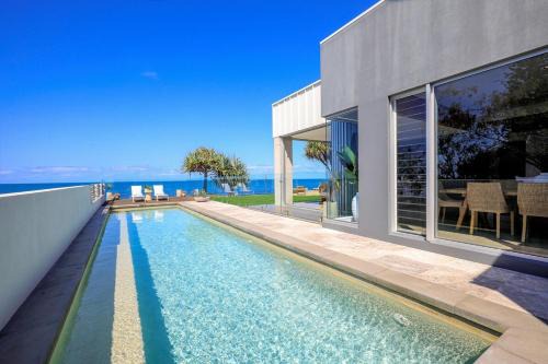 Bargara House | Riva - Oceanfront, Heated pool, 3 bathrooms, Sleeps 8