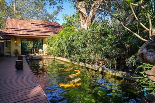 Saraphi House | Rustic Tropical Residence