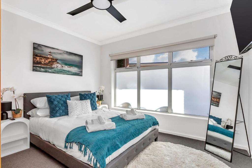 West Beach Apartment | Stylish Seaside Suite with Arcade and Balcony