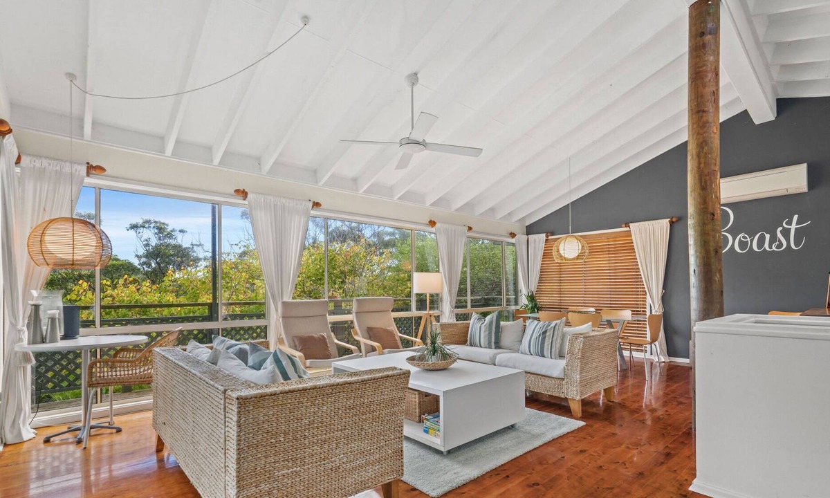 Copacabana House | Sublime Beach Getaway, Spacious Balcony with BBQ