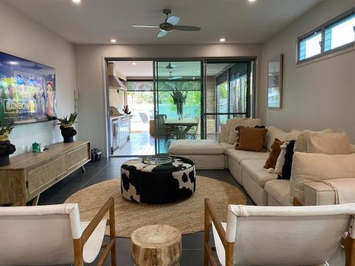 Mudjimba House | The Palm - Beachside Home with Heated Pool, Cinema & Games Room