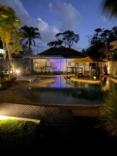 Lake Munmorah Villa | Waterfront Oasis Lakefront Villa with Pool and Sauna