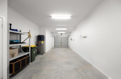 Northcote House | 3BR Townhouse with Private Terrace & Double Garage