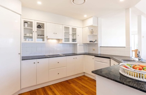 Corlette House | 74A Sergeant Baker Drive - comfortable duplex with beautiful distant water views