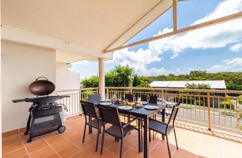 Corlette House | 74A Sergeant Baker Drive comfortable duplex with beautiful distant water views