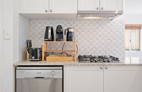 Wembley House | Air conditioned house near city and beach with secure garage