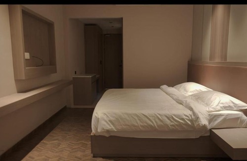 Theni Hotel | Ask Grande