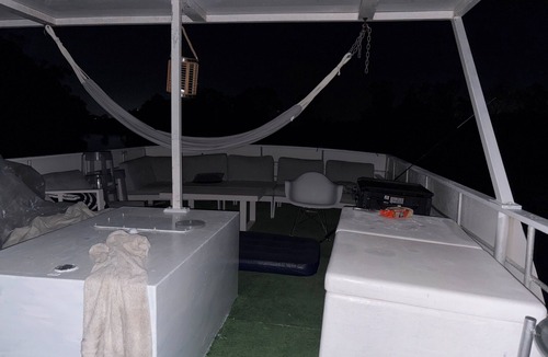 Coomera Boat Rental | Barra 1- Peaceful double level house boat and tender
