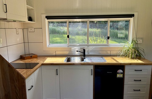 North Deep Creek Cottage | Bee Farm Off-Grid Tiny Home Stay. Pet Friendly!