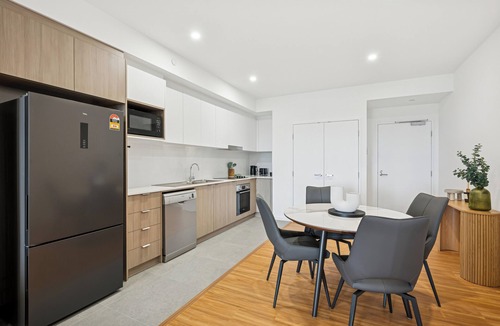 Cannington Apartment | Cannington Comfort – Beside Carousel & Curtin, featuring modern design and rooftop amenities.