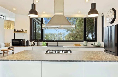 Rhyll House | Casa de Palmeras