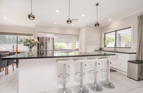 Curtin Apartment | Charming 4-Bed Getaway with Pool & Garden Oasis