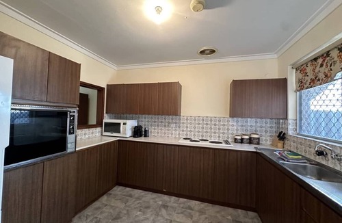 Wembley House | Charming convenience in central Wembley - whole home with yard, pets welcome