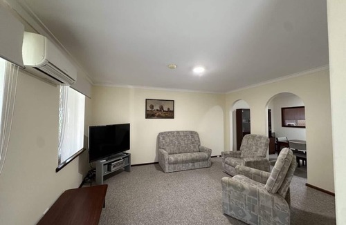 Wembley House | Charming convenience in central Wembley - whole home with yard, pets welcome