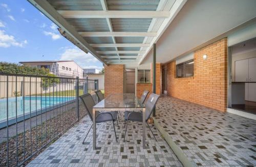 Robertson House | Chic Vibes Oasis Pool and Patio Comfort for Groups