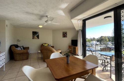 Dicky Beach Apartment | Coastal 2-bedroom apartment at Portobello by the Sea, Dicky Beach. Enjoy ocean glimpses, resort pool, and BBQ area. Sleeps 4 comfortably. Steps from surf, cafes, and shops. Perfect for a relaxing Sunshine Coast holiday.