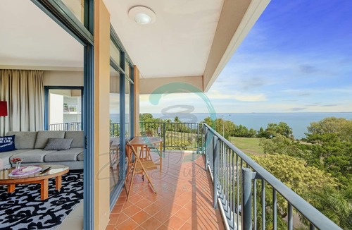 Darwin City Centre Apartment | Coastal Elegance Sunset Pool Balcony Dining