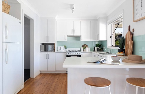Culburra Beach House | Coastal Palms – your sun-soaked coastal getaway