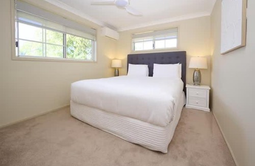Woolgoolga House | Coastal Retreat with Pool and Balcony Views
