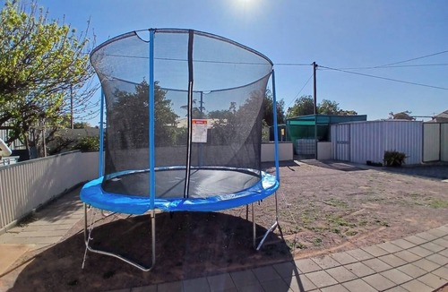 Whyalla Stuart House | Cozy industrial home with hot tub & fruit garden