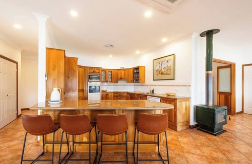 Yamba House | Crystal Palms - Oceanstays - Fireplace & Riverside