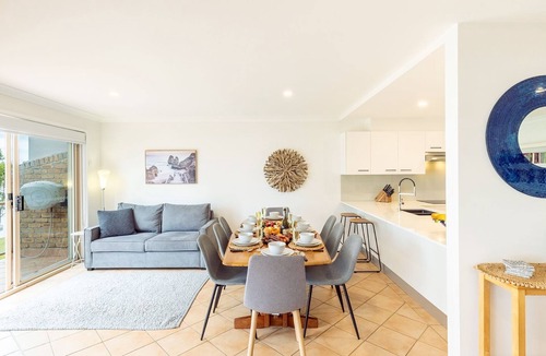 Corlette House | Danalene, 44a Danalene Pde - stunning waterfront property with Air Con, WI-FI, Garage & Boat Parking