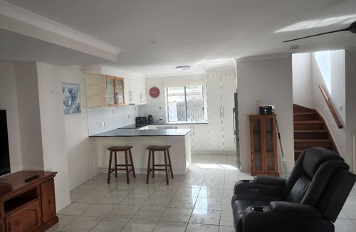 Tin Can Bay Apartment | Delightful three bedroom unit by the beach. Beautiful sunsets