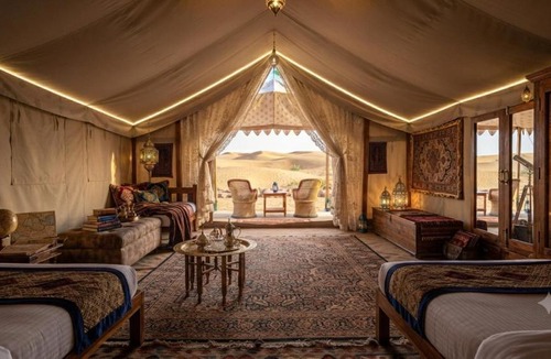 Sam Hotel | Desert Bloom Camp And Resort