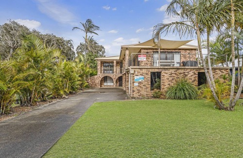Hat Head House | Directly opposite the beach access and a leisurely stroll to the club,.