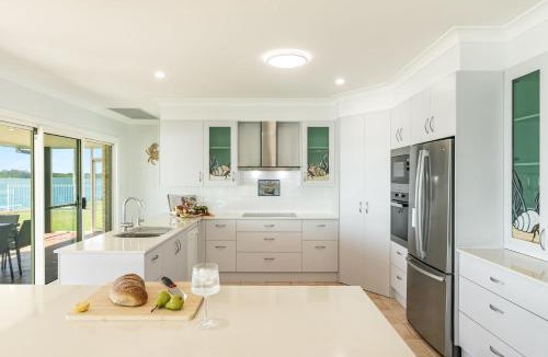 Yamba House | Dolphin View - Elegant Waterfront Haven with Private Pontoon - Holiday Yamba