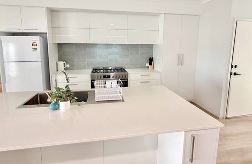 Eaton House | Eagle Breeze is a modern 3-bedroom, 2-bathroom home in Eaton