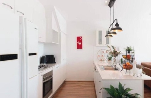 Watson House | Easy Garden with Bush surrounding Living. Free 2 Parking