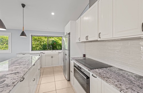 Sandgate Apartment | Family-Sized Retreat with Private Garage
