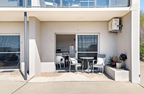 Narooma Apartment | Golfers View Unit 1 - enjoy spectacular views of the ocean and golf course.