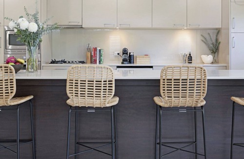 Bateau Bay House | Heated swimming pool and walk to beach
