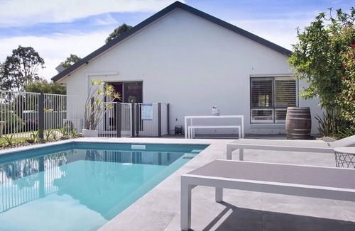 Ulladulla House | Kokomo on Village - with a pool & large yard.