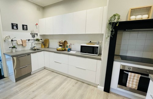 Edwardstown House | Large backyard with outdoor seating and BBQ!