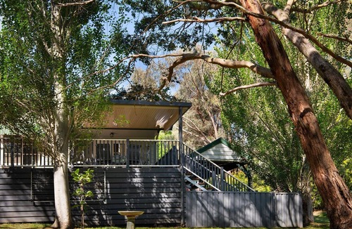 Hepburn Springs House | Lucini Two Outdoor deck, gas log fire
