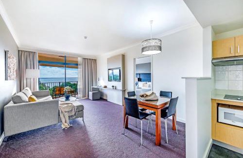 Darwin City Centre Apartment | Lush Vista - Poolside Living on Esplanade with Balcony