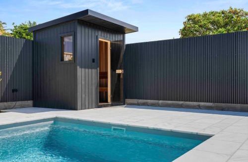Culburra Beach House | Luxe 4BR Retreat with Heated Pool & Finnish Sauna, Steps to the Beach